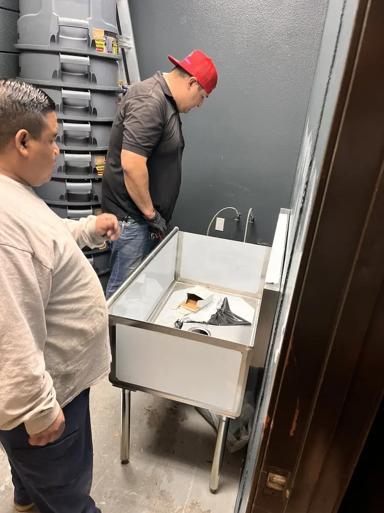 Commercial plumbing and sink installation in Quebec